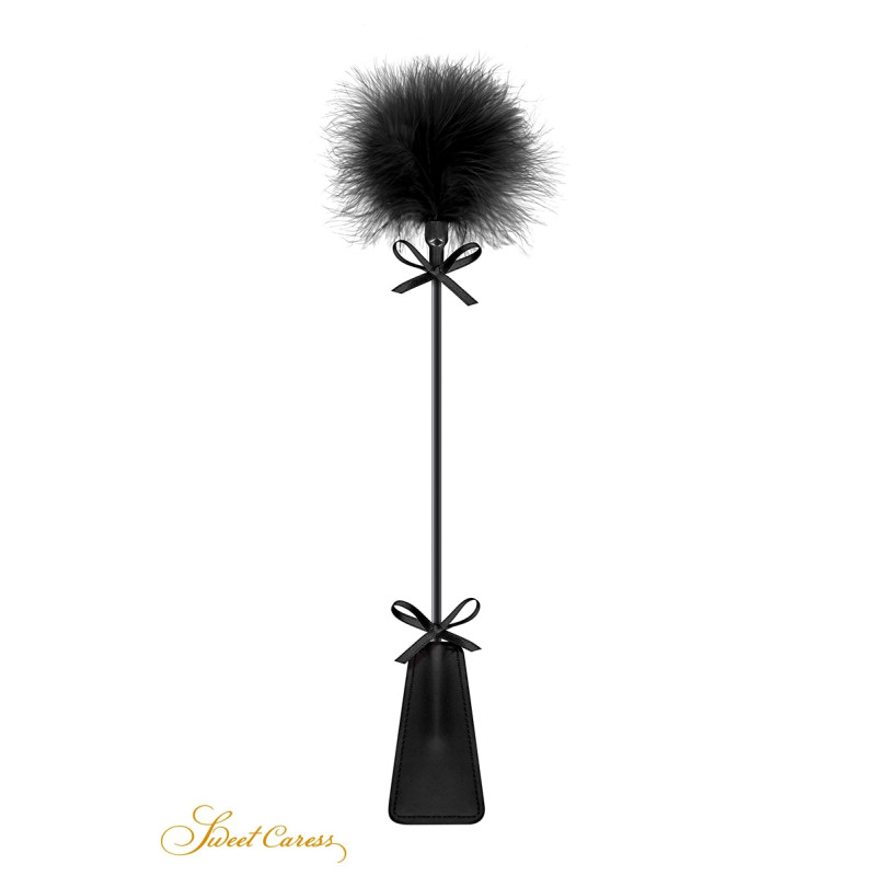 Tapette avec pompon noir