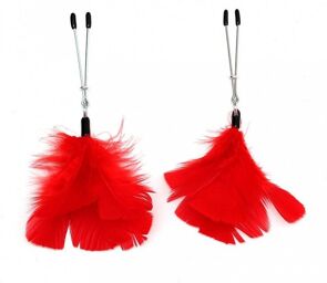 Pinces à seins avec plumes