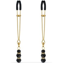Pinces à mamelons dorées avec des perles noires